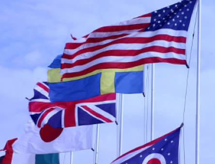 Multiple national flags waving