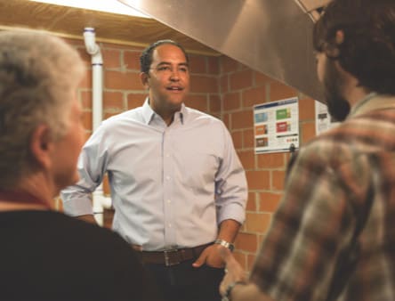Will Hurd speaking with two supporters