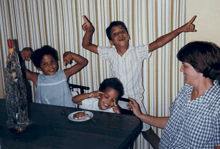 Photo: My sister, brother, and I (seated) celebrating with my mom.