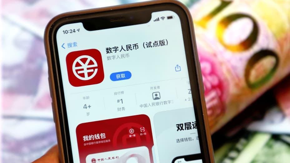 Photo: An E-CNY app is displayed on a mobile phone in Ganzi, Sichuan Province, China - Costfoto/Future Publishing via Getty Images (Jan 4, 2022)