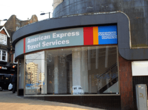 Photo: An American Express Travel Services Office in London, England. According to Bureau of Labor Statistics data, the number of full-time travel agency employees in the U.S. had fallen from a peak of 124,000 in 2000 to 64,000 twelve years later.