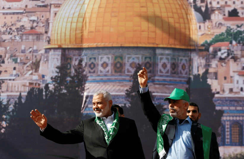 Photo: Hamas leaders Ismail Haniyeh and Yehya Al-Sinwar in Gaza City on December 14, 2017 - MOHAMMED SALEM/REUTERS)
